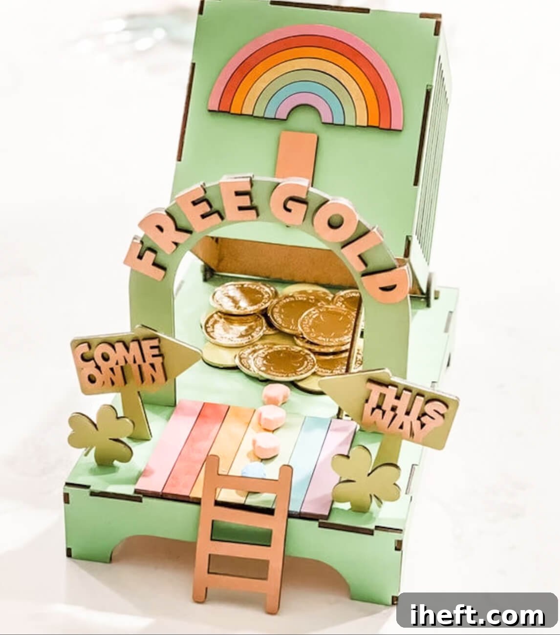 A DIY leprechaun trap kit with various craft supplies in a box.