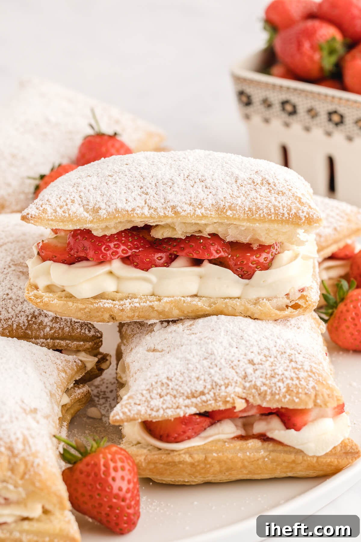 6 beautiful Napoleon desserts (Mille-Feuille) made with layers of puff pastry, cream, and strawberries. 