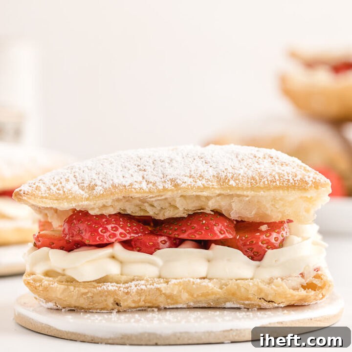A beautiful Napoleon Dessert made with strawberry and puff pastry.