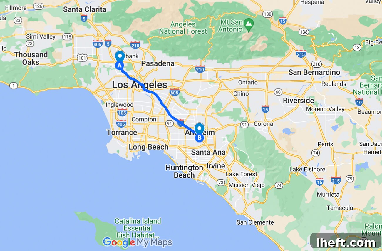 A Google Maps screenshot illustrating the driving directions and approximate distance between Universal Studios in Hollywood and Disneyland in Anaheim, clearly showing the route.