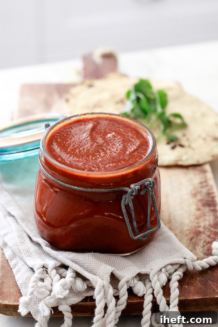 This simple recipe yields the best easy homemade mild red enchilada sauce, perfect for a variety of dishes!