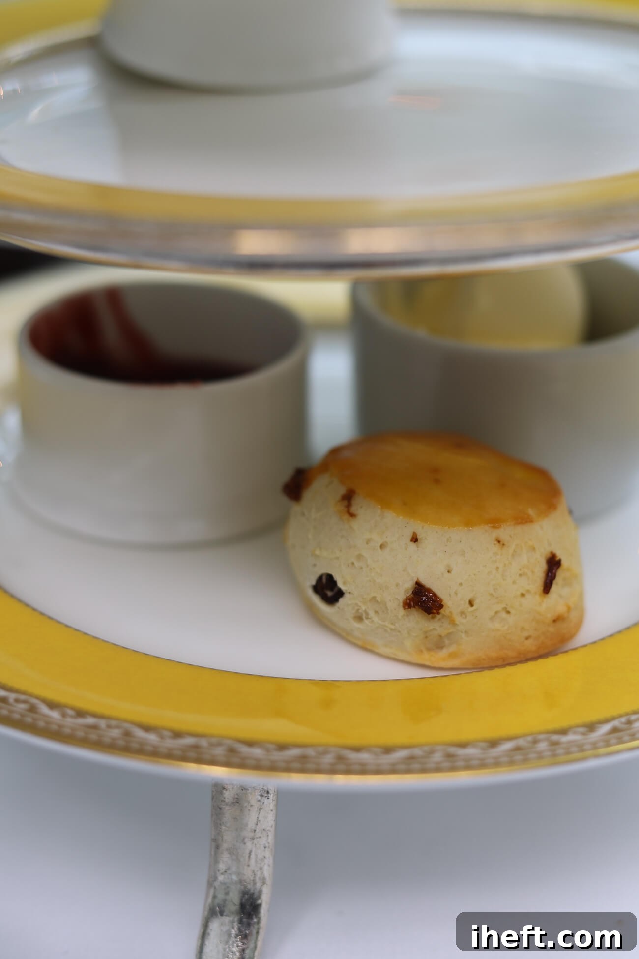 A serene and inviting corner of The Veranda at The Goring Hotel, showcasing elegant seating and the peaceful ambiance perfect for a luxury afternoon tea experience, hinting at the refined dress code.