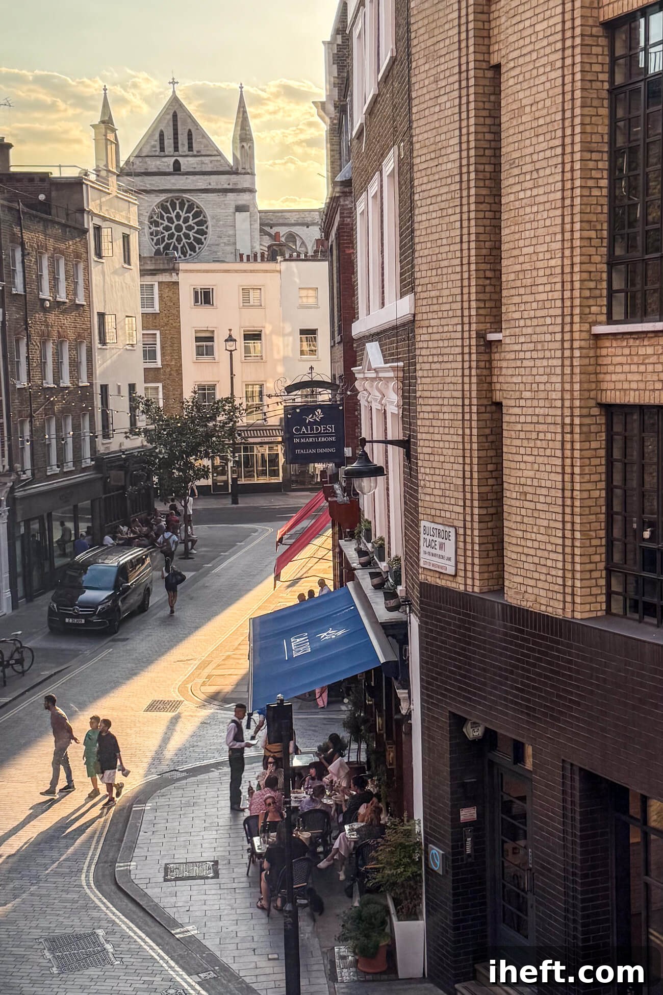 View from a window of Marylebone village with Caldesi restaurant in the foreground and a church in the background. 