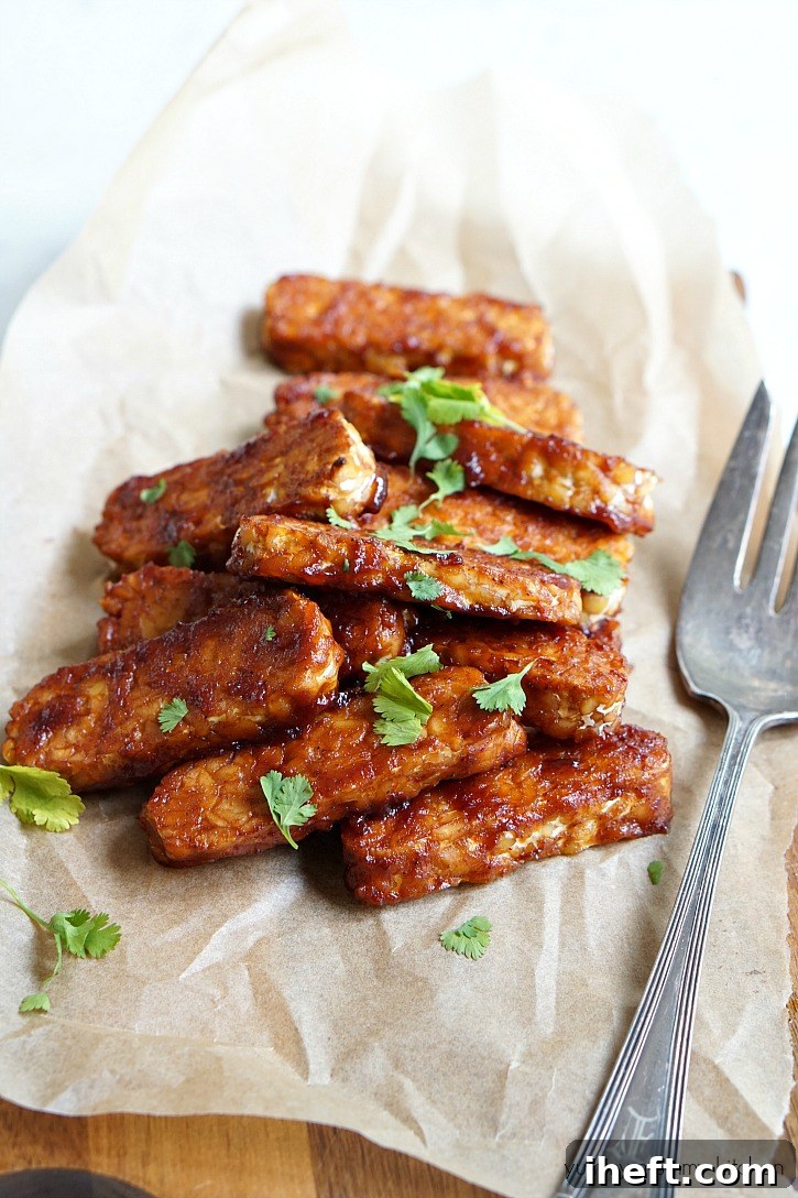 Discover how to make easy BBQ tempeh. BBQ tempeh is an excellent vegan plant-based protein option that's delicious on salads, sandwiches, wraps, or paired with veggies and rice.