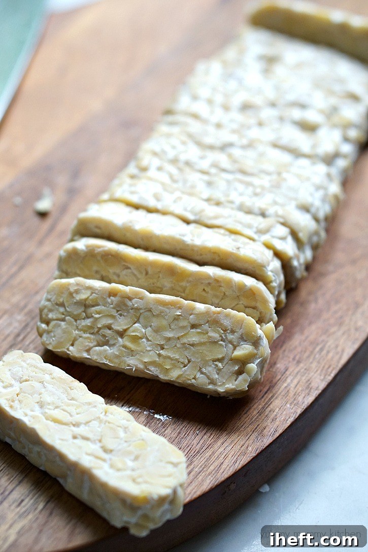 Learn how to cook tempeh, understand its health benefits, and get a delicious BBQ tempeh recipe.