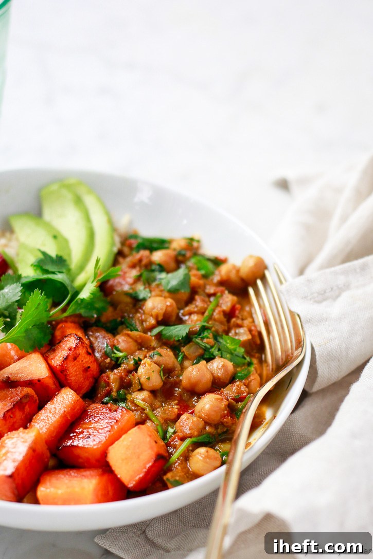 Tender chickpeas simmered in a rich, aromatic Indian spiced sauce create a wonderfully delicious and easy vegan meal, a true staple of Indian cuisine.