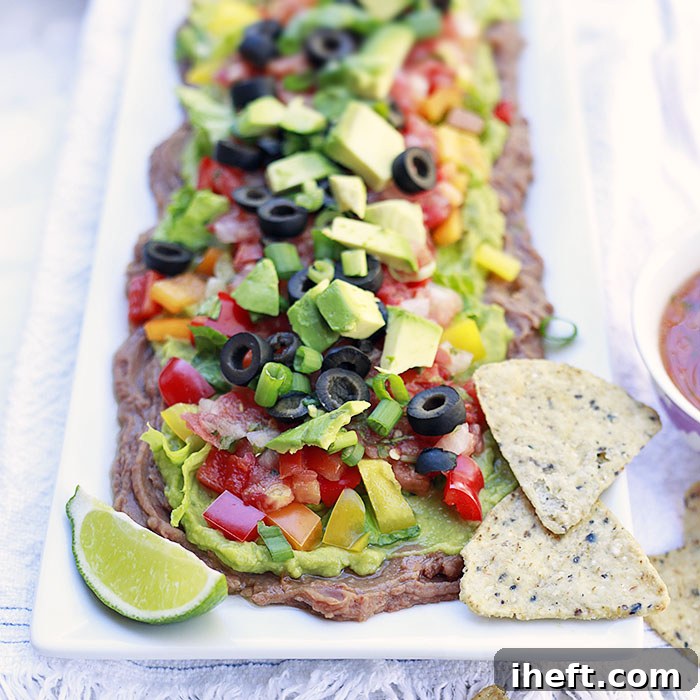Healthy 7 Layer Mexican Bean Dip for parties.