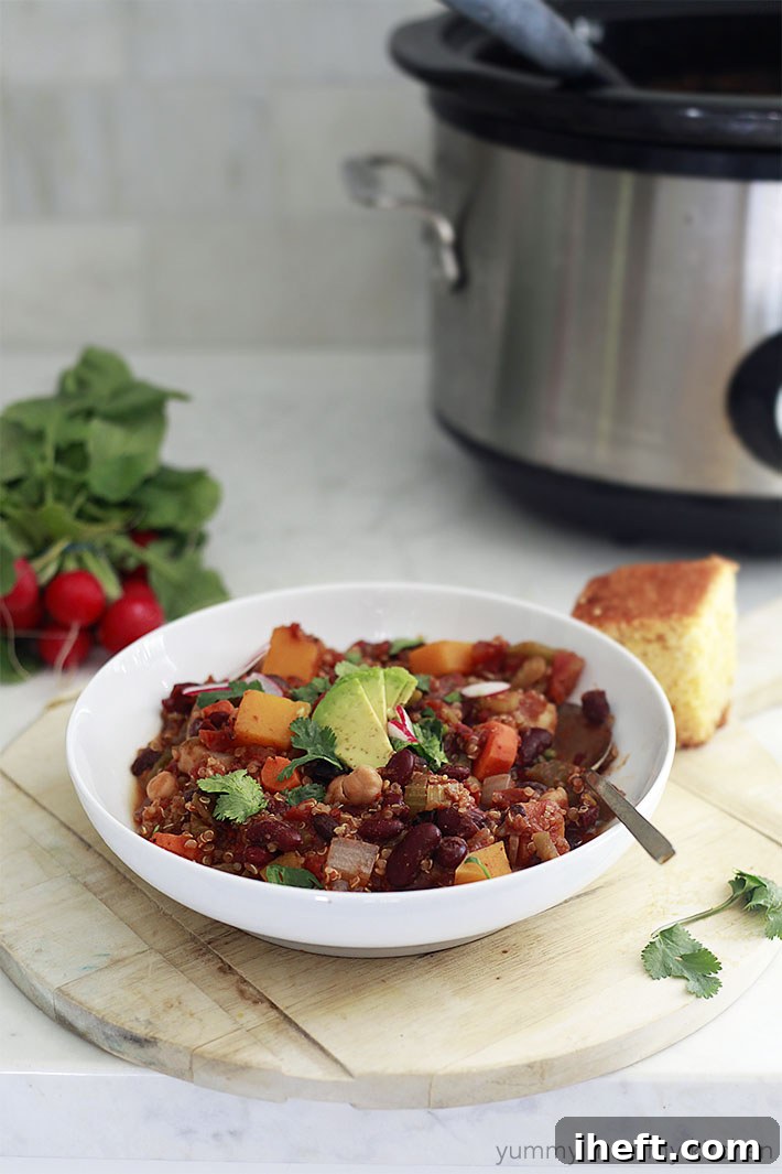 easy vegetarian slow cooker chili with beans, quinoa, and butternut squash, perfect for a healthy family meal