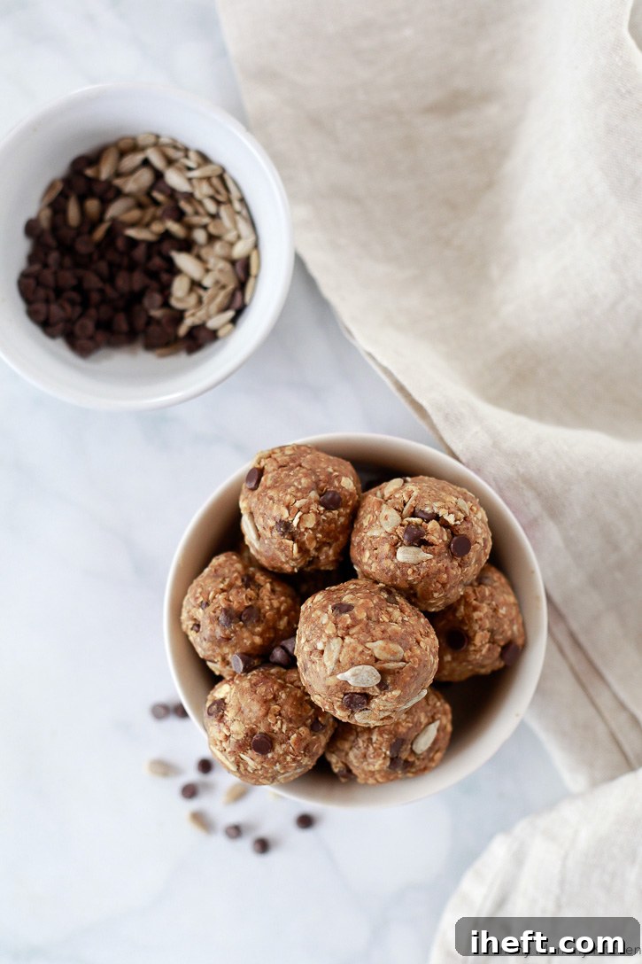 These perfectly portioned, allergy-friendly energy balls are the ideal nut-free, gluten-free, and dairy-free snack for kids' lunch boxes, ensuring a healthy and safe treat.