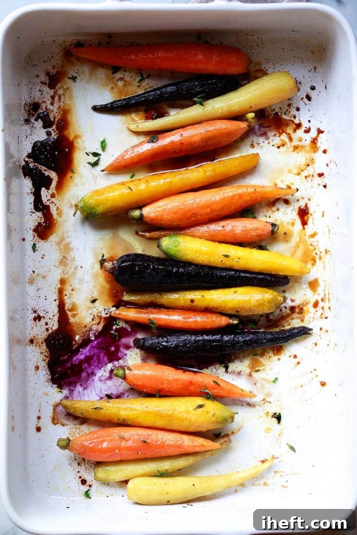 A colorful platter of rainbow glazed carrots, beautifully roasted.