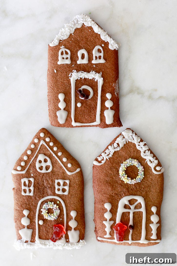 These gingerbread house cookies offer a fun, easy alternative to building full gingerbread houses. Made with a gluten-free, paleo, and vegan almond flour gingerbread cookie dough, they are both delicious and adorable.