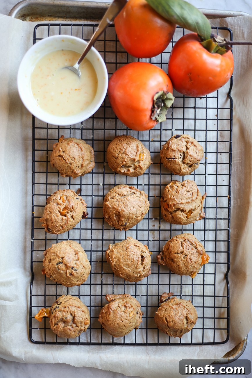 Delicious persimmon cookies cooling on a wire rack, freshly baked.