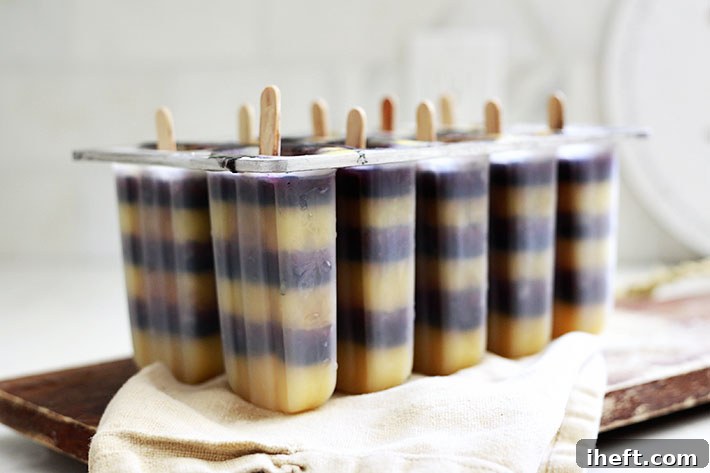 Close-up of natural Halloween popsicles with an ombre effect, perfect for a healthy spooky treat