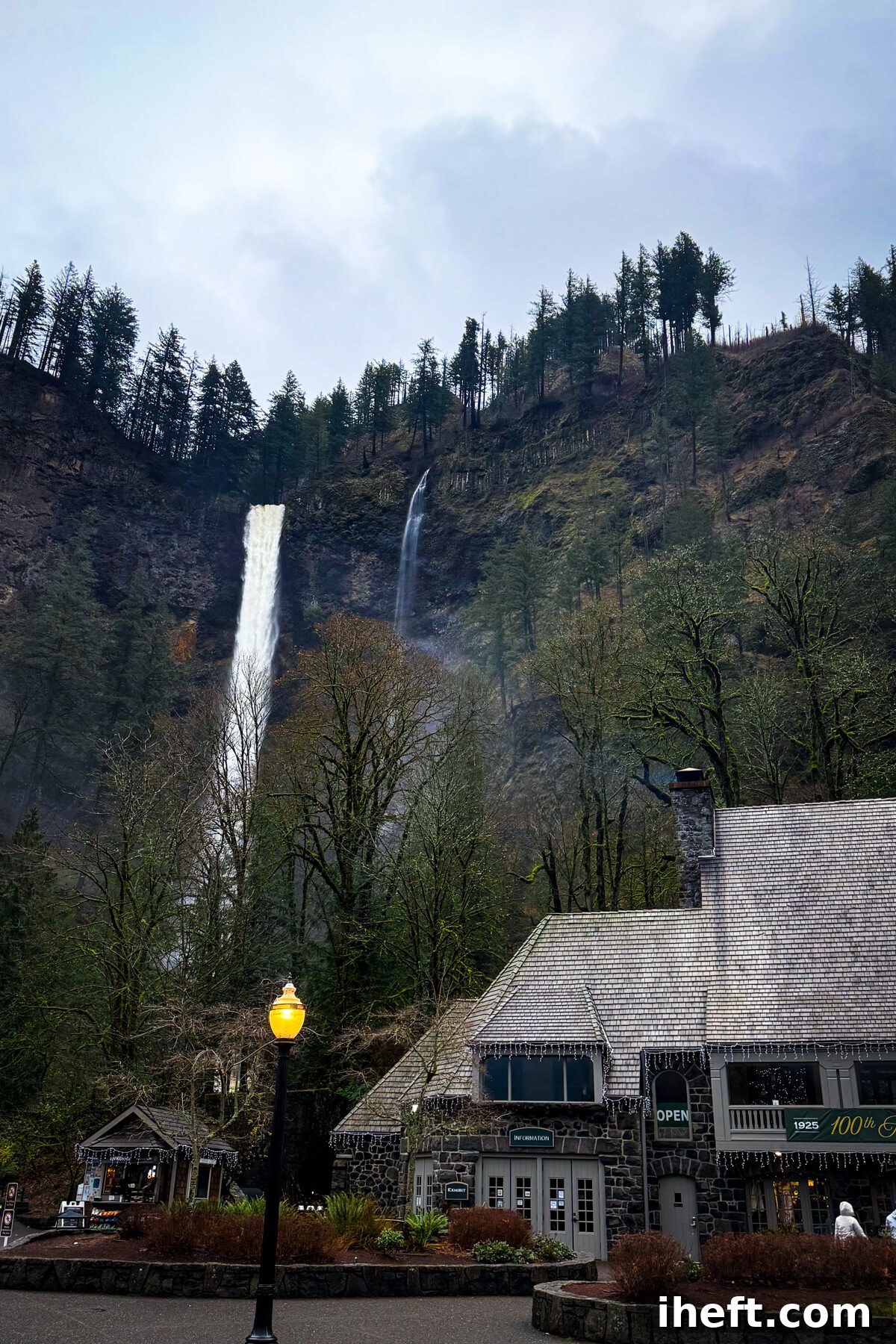 Multnomah Falls rising above Multnomah Falls Lodge in the Columbia River Gorge.